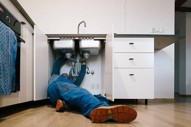 Professional Emergency Plumber technician working in Saint Bonifacius, MN